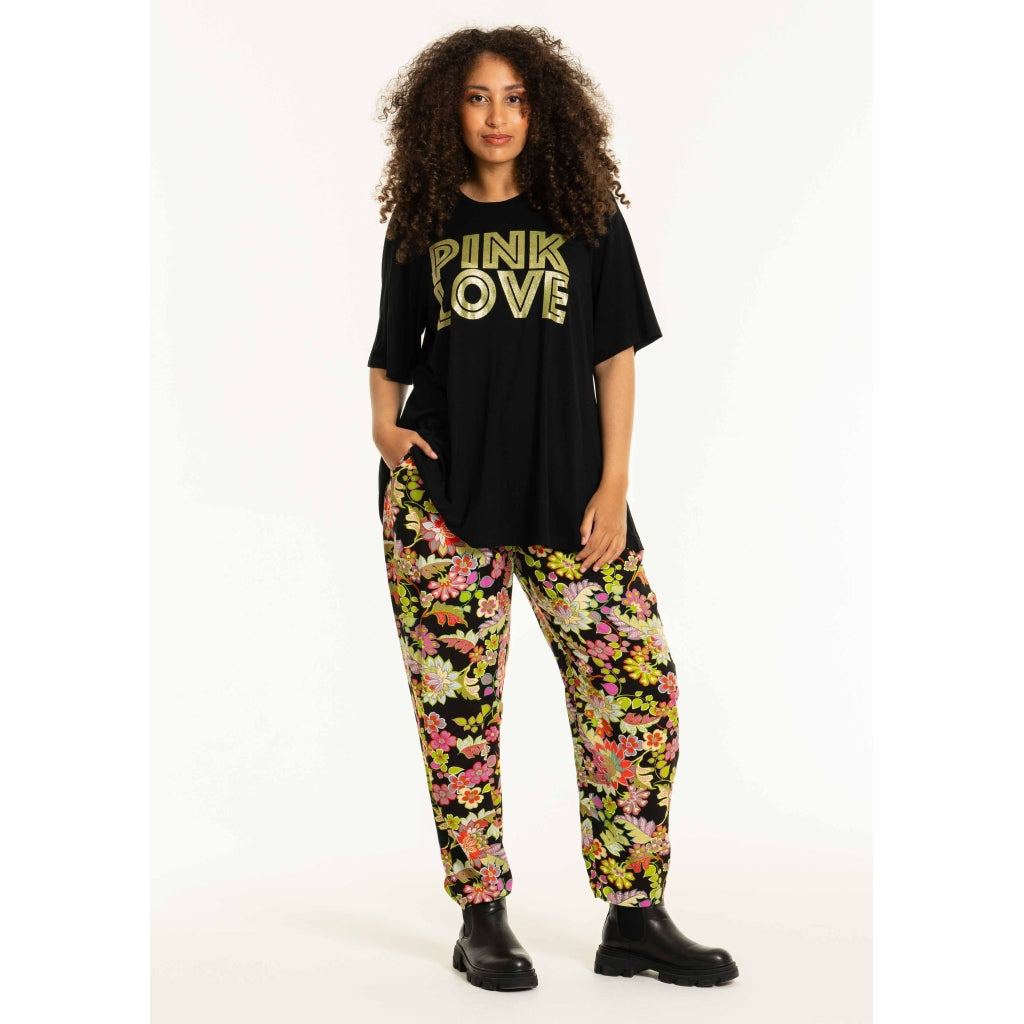 Studio SChristine Trousers WITHOUT elastic in legs Trousers Black with lime flowers