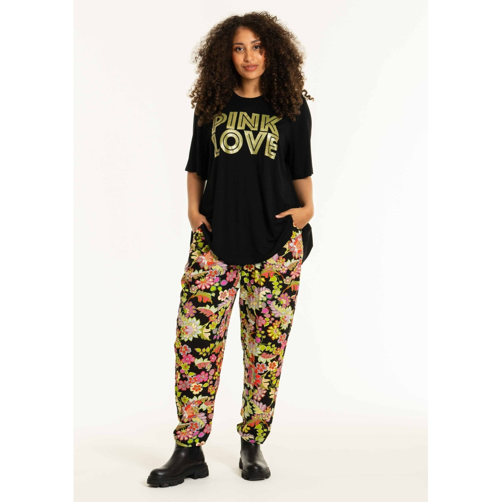 Studio SChristine Trousers WITHOUT elastic in legs Trousers Black with lime flowers