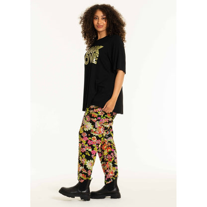 Studio SChristine Trousers WITHOUT elastic in legs Trousers Black with lime flowers